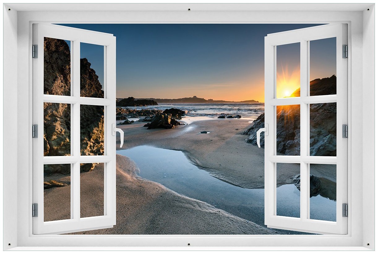 Wallario Sichtschutzzaunmatten Sonnenuntergang hinter einem Felsen am Strand, mit Fenster-Illusion von Wallario