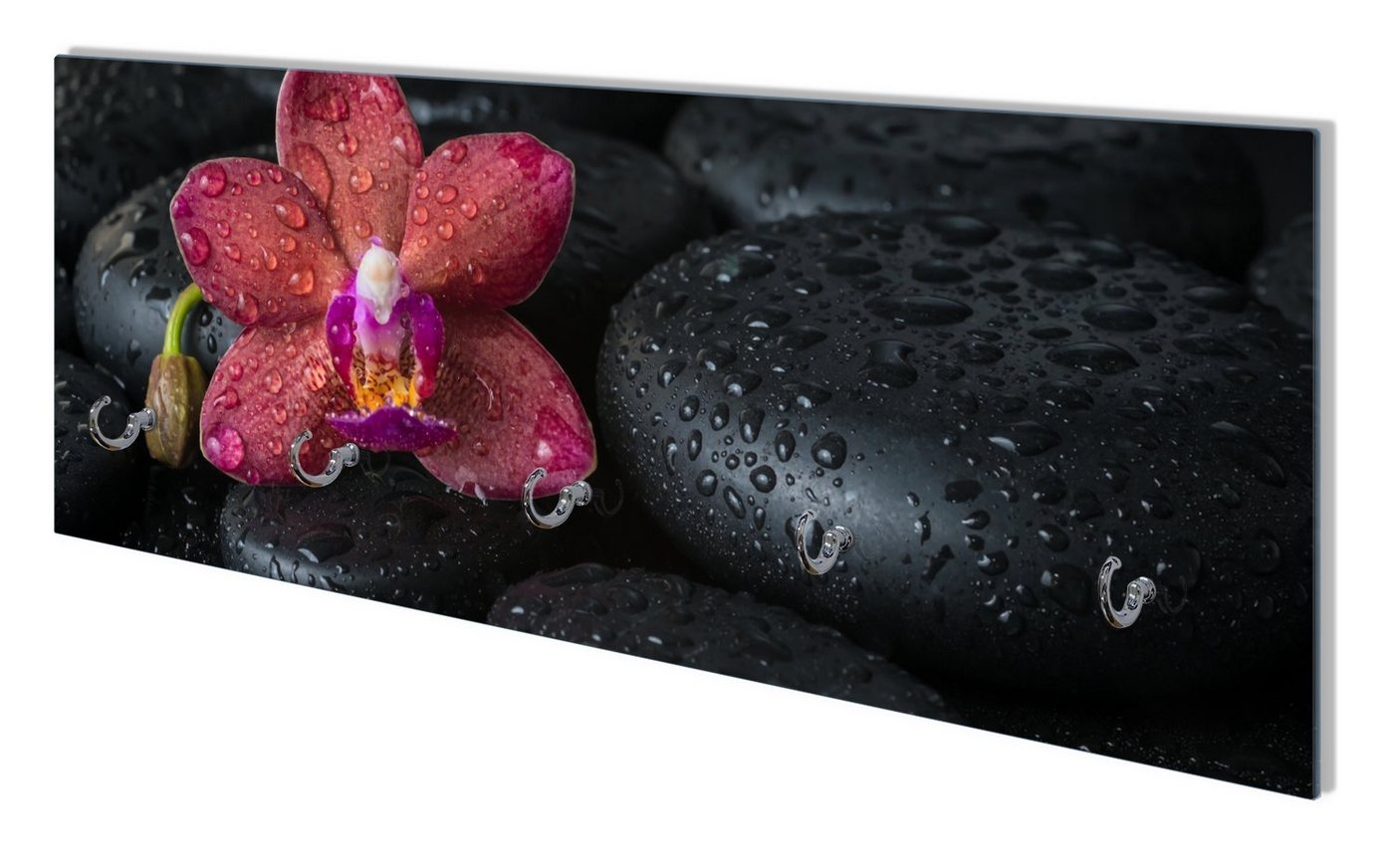 Wallario Wandgarderobe Orchideen-Blüte auf schwarzen Steinen, benetzt mit Wasser-Tropfen (1-teilig, inkl. Haken und Befestigungsset), 80x30cm, aus ESG-Sicherheitsglas von Wallario