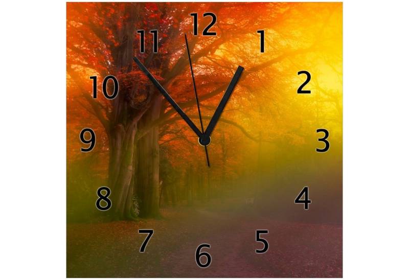 Wallario Wanduhr Bunter Herbst - Waldlandschaft bei Nebel in Regenbogenfarben (Glasuhr) von Wallario