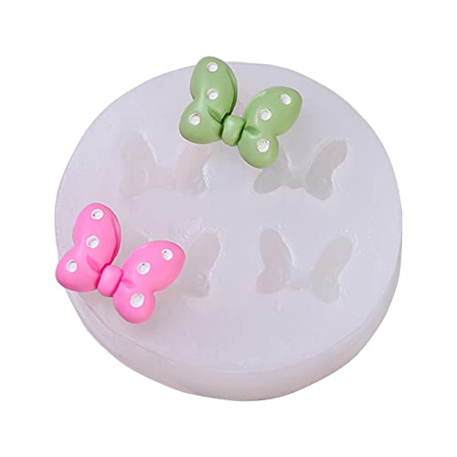 Fondantformen Mousse Form Gips Schokoladen Kerzenform Kuchenform Schimmelmütze Silikonmaterial Bogenknotenformen Zum Backen Fondantformen Mousse Form Gips Schokoladen Kerzenform Kuchenform Schimmelmütze Silikonmaterial Bogenknotenformen Zum Backen von Wdbild
