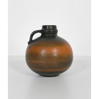 Runde Vintage Carstens Atelier Tönnieshof Fat Lava Gerda Hückeroth Krug Vase Brutalist Orange Schwarzes Gefäß Westdeutscher Keramikgriff von WestEstStudio
