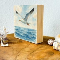 Meerliebe Möwe Meer Ozean See Holzbild Holzblock | 10x10x2cm Geschenk Urlaub Sommer Freiheit Maritim Deko Wohndeko Wohnakzent Wohnaccessoire von WishcraftersDE