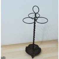 Mid Century Schweren Gusseisen Schirmständer, Schmiedeeisen Halter Cane Ständer, Stickständer, Eingangsbereich Dekor von WithAScentOfCinnamon
