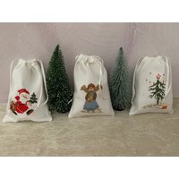 Wunderschöne Weihnachtsstickerei Weihnachtssäckchen/ Geschenkesäckchen /Weihnachtsdeko /Schönerwohnen /Handarbeit/ Geschenk/ Interiordesign Wunderschöne Weihnachtsstickerei Weihnachtssäckchen/ Geschenkesäckchen /Weihnachtsdeko /Schönerwohnen /Handarbeit/ Geschenk/ Interiordesign von WituCreativ