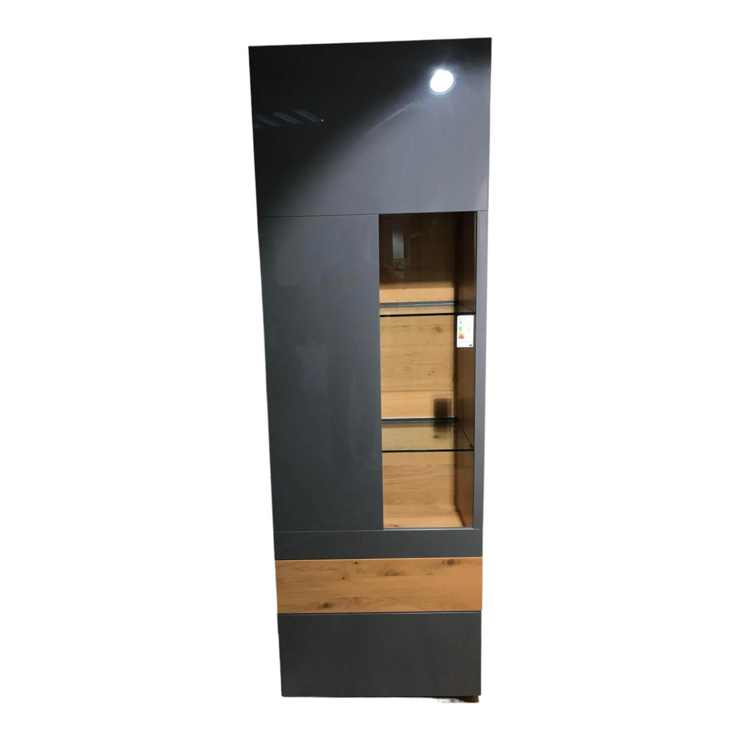 Vitrine Naxos 6743 Korpus Lack Granit Dunkel Front Hochglanzlack Granit Dunkel S... Vitrine Naxos 6743 Korpus Lack Granit Dunkel Front Hochglanzlack Granit Dunkel S... von Wöstmann
