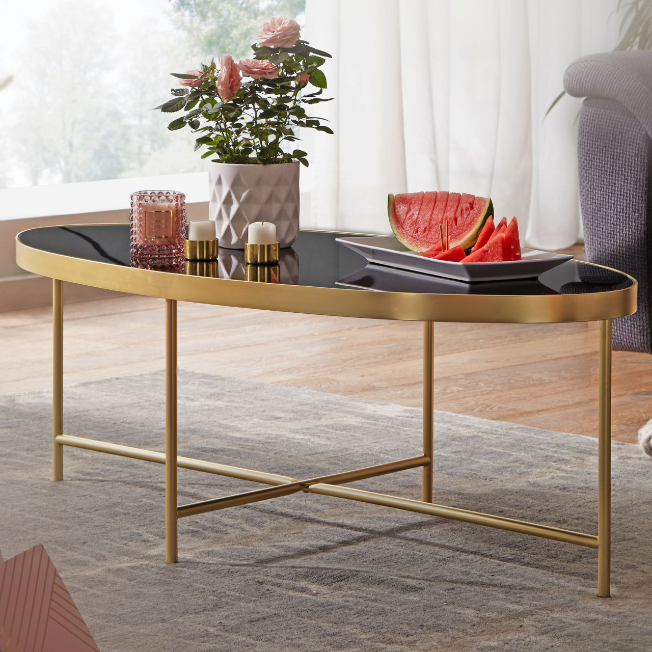 Design Couchtisch Glas Schwarz - Oval 110 x 56 cm mit Gold Metallgestell von Wohnling