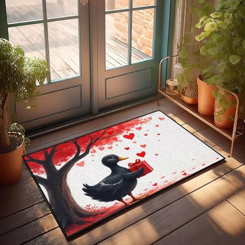 XYBH Fußmatte "Home Alone", schwarze Ente, die eine rote Geschenkbox unter einem Baum mit herzförmigen Blättern hält. Fußmatte für den Außenbereich, 40 x 60 cm von XYBH