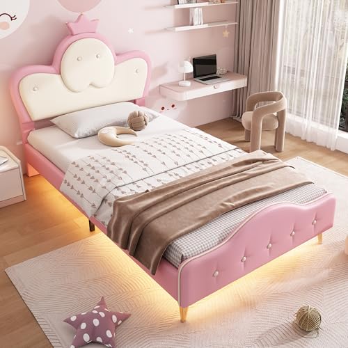 Gepolstertes Kinder-Einzelbett 90 x 200 cm PU rosa + weiß Weiche Schutzkanten zur Vermeidung von Kollisionen Kronenfüße aus Metall Gewelltes Bettteil mit Zugpunkten und einfarbigem LED-Streifen Gepolstertes Kinder-Einzelbett 90 x 200 cm PU rosa + weiß Weiche Schutzkanten zur Vermeidung von Kollisionen Kronenfüße aus Metall Gewelltes Bettteil mit Zugpunkten und einfarbigem LED-Streifen von YuQozii