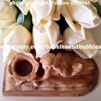 Hand Geschnitzte Cherub Kerzenhalter Aus Olivenholz Hand Geschnitzte Cherub Kerzenhalter Aus Olivenholz von babblesandbubbles