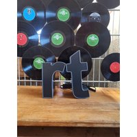 Vintage Leuchtreklame Schwarz Vintage Leuchtreklame Schwarz von blackpeacockvintage