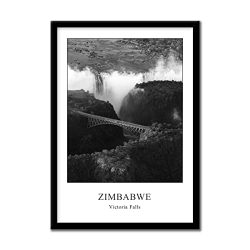 Rahmenbild Simbabwe Victoriafälle 50 x 70 cm | Wandbild Bild mit Rahmen schwarz Hochformat | Afrika Wasserfall Natur Brücke | elegant modern schwarzweiß | Wohnzimmer Schlafzimmer Büro Deko Schriftzug von daazoo