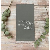 Geschirrtuch „Die Geheime Zutat..." von dieplotterani