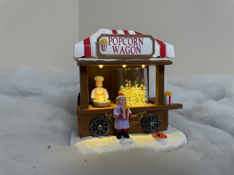 e4fun Dekofigur Weihnachtsdorf: Popcornautomat mit LED, bewegenden Popcorns (2 St) von e4fun