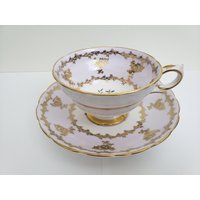 Vintage Grosvenor Teetasse Und Untertasse Set Pearl Grey Gold Filigree Design Mit Roter Rose Goldrand B55 von gamblordcollectables