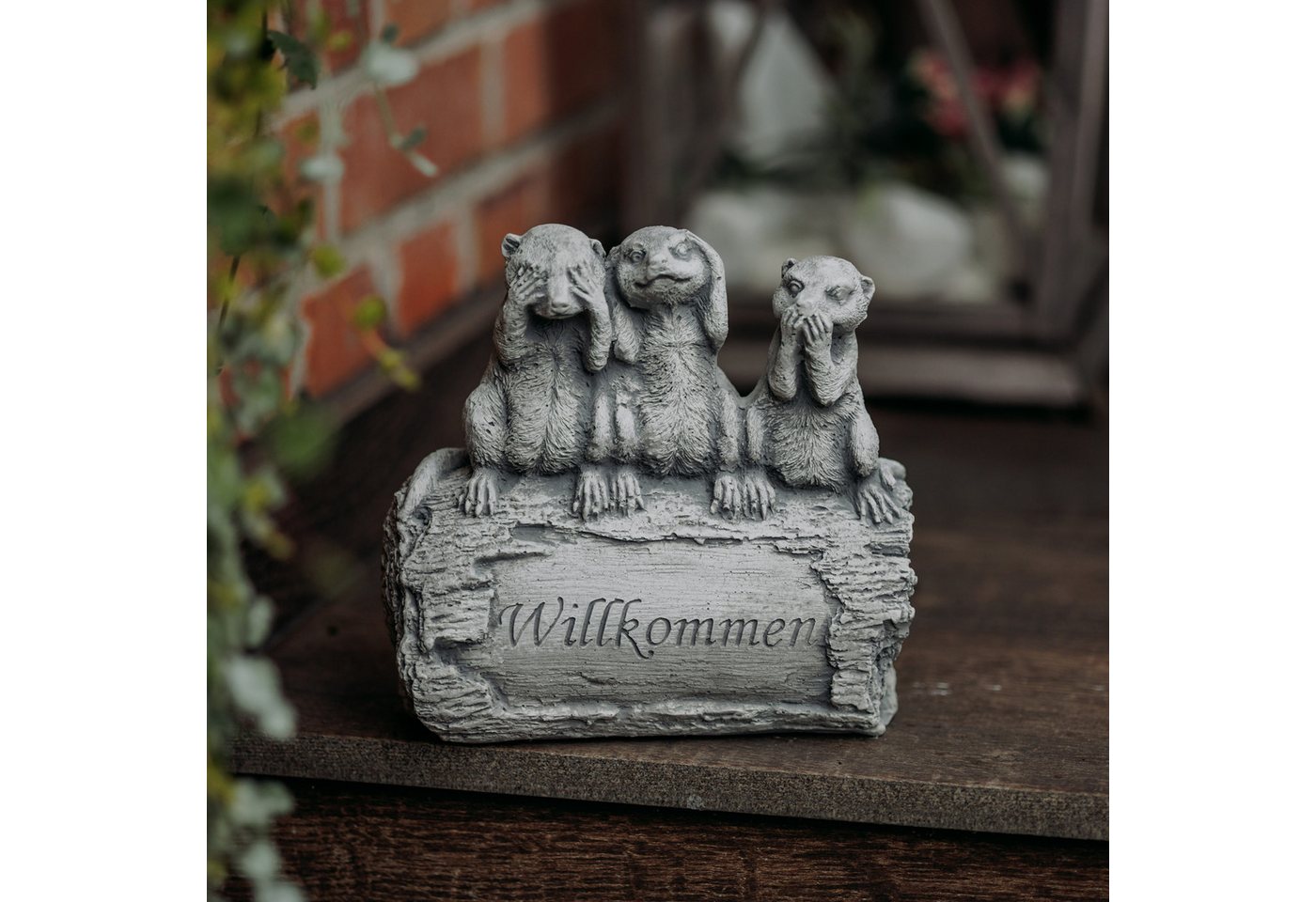 gartendekoparadies.de Gartenfigur Erdmännchen-Familie sagt: Willkommen, Steinfigur, H. 20 cm, 4 kg, Frostsicher von gartendekoparadies.de