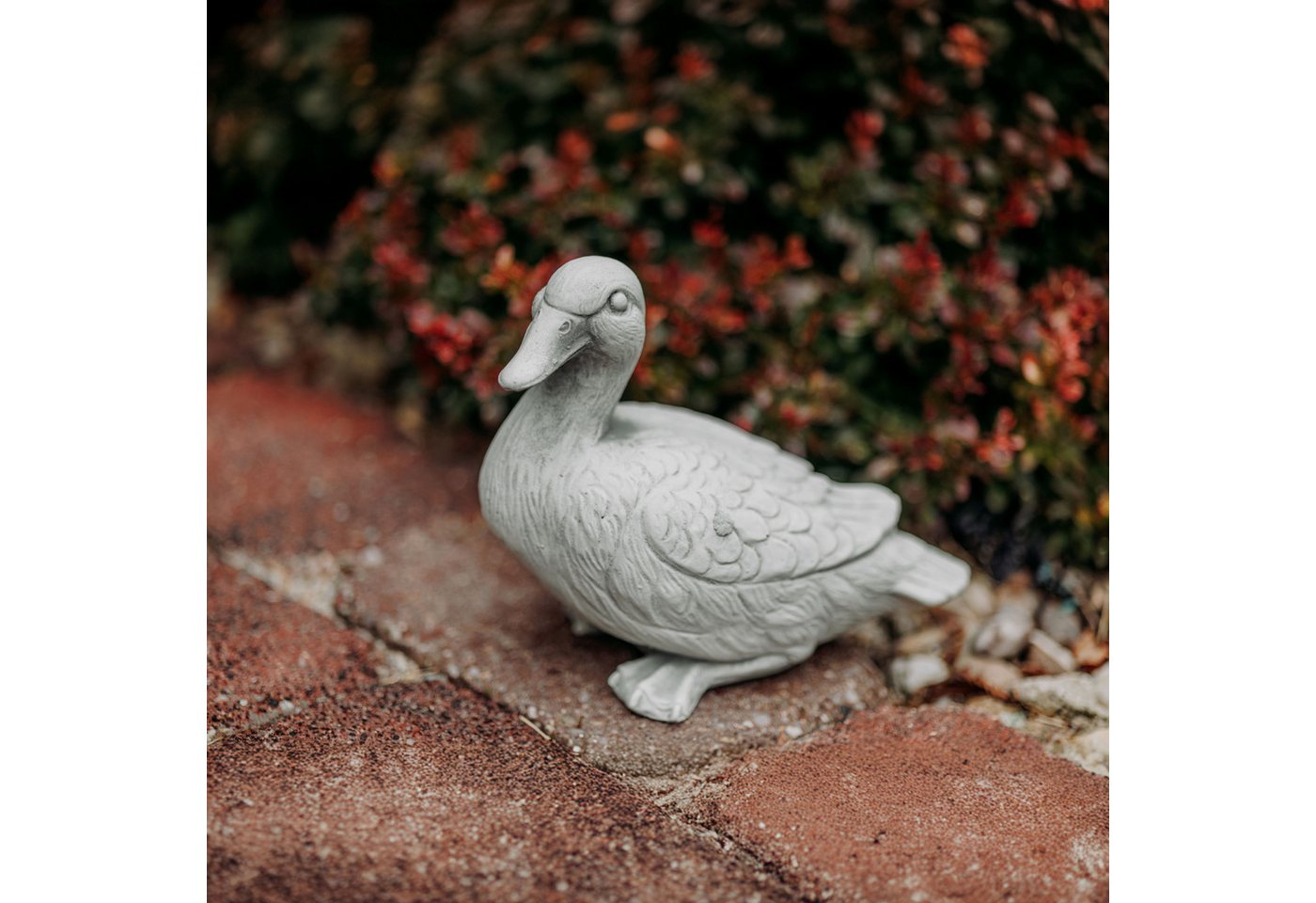 gartendekoparadies.de Gartenfigur Niedliche Ente, Steinfigur, H. 18 cm, 3 kg, Frostsicher von gartendekoparadies.de