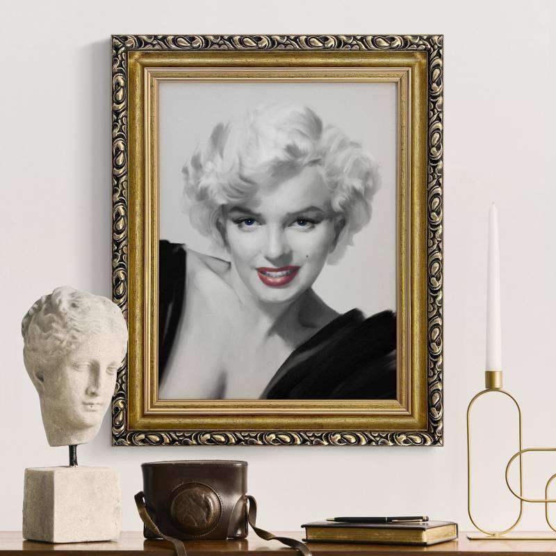 Leinwandbild mit Barockrahmen Marilyn auf Sofa