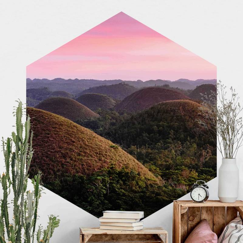 Hexagon Fototapete selbstklebend Schokoladenhügel bei Sonnenuntergang