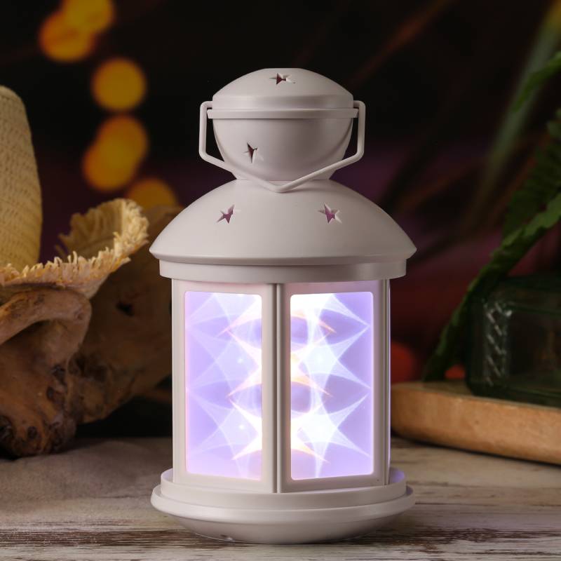 LED Laterne - weiße Sternenmuster - bewegt/Dauerleuchten - H: 22cm - Batteriebetrieb - weiß von MARELIDA