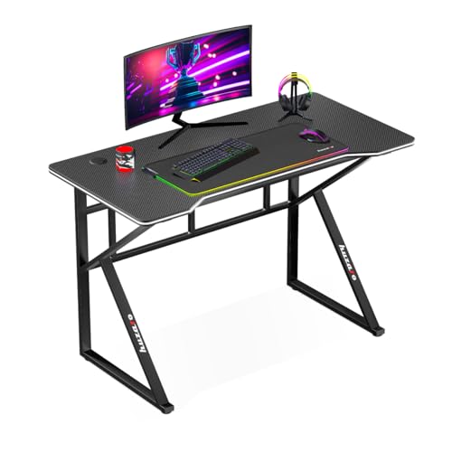 huzaro Hero 1.6 Black | Computertisch Gamingtisch Schreibtisch Bürotisch PC Tisch | 120 x 60 cm | Zwei Kabeldurchführung | Gaming Homeoffice | Stahlkonstruktion Carbon Tischplatte | Schwarz von huzaro