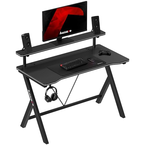 huzaro Hero 1.9 | Gaming Schreibtisch 120 x 60 cm mit Ablage & Kabeldurchlass | Kratzfestes Carbon Design | Kopfhörerhalter | Ergonomischer Gamer Tisch mit Stahlgestell | Schwarz huzaro Hero 1.9 | Gaming Schreibtisch 120 x 60 cm mit Ablage & Kabeldurchlass | Kratzfestes Carbon Design | Kopfhörerhalter | Ergonomischer Gamer Tisch mit Stahlgestell | Schwarz von huzaro