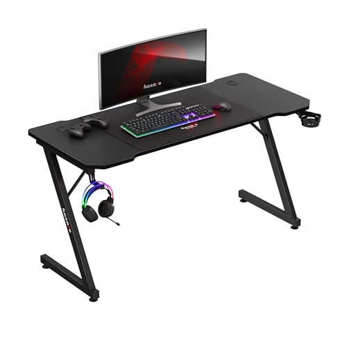 huzaro Hero 3.3 Black | Gaming PC Tisch Schreibtisch | Inklusive Mauspad | Kopfhörerhaken Getränkehalter | Kabelorganisator | Carbon Tischplatte | Stabiler Computertisch | 140x60cm | Schwarz von huzaro