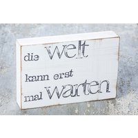 Text Bild An Der Wand "Die Welt Kann Warten" von iopla