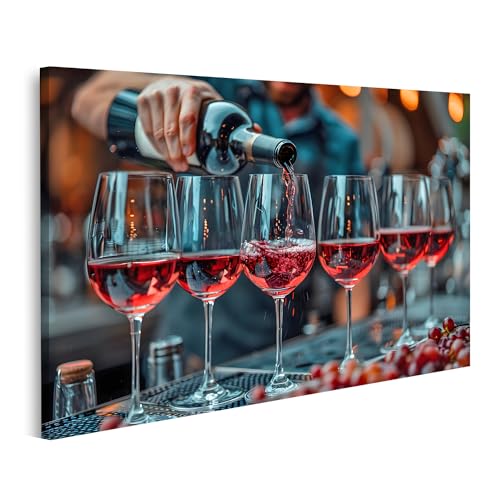 islandburner Bild auf Leinwand Eine Person füllt eine Reihe Weingläser mit edlem Rotwein auf dem Wandbild Weinkeller Weinhandel Wandbilder Bilder von islandburner