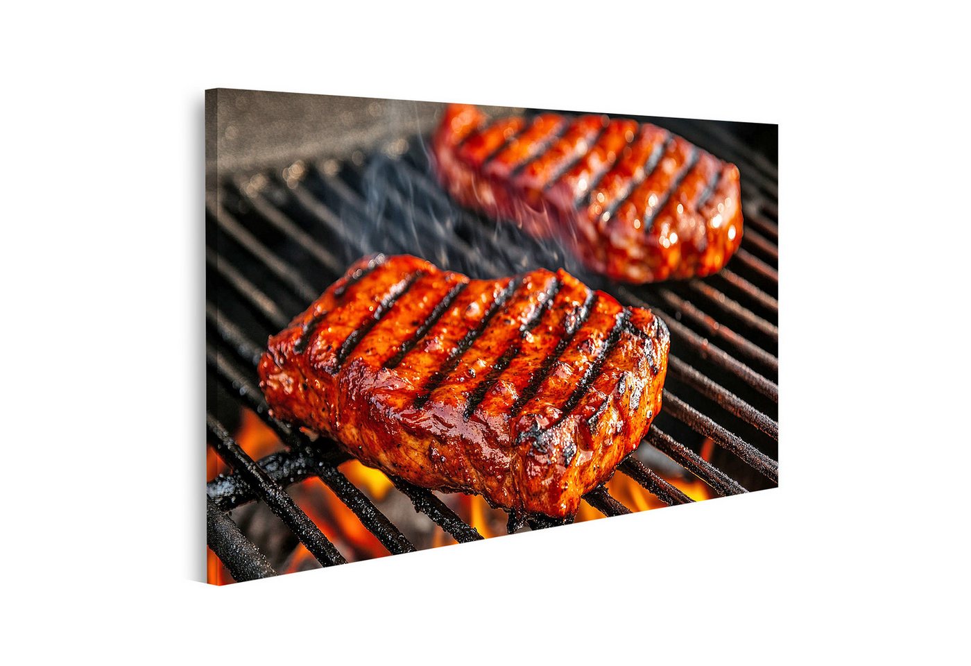 islandburner Leinwandbild, Saftige gegrillte Steaks auf dem Grill mit Flammen von islandburner