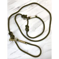 Moxonleine | Retrieverleine „Olive Tree" Aus Grünem Tau Mit Gold Umwickelung Und Karabiner - Verschiedene Größen Moxonleine | Retrieverleine „Olive Tree" Aus Grünem Tau Mit Gold Umwickelung Und Karabiner - Verschiedene Größen von moonandneck