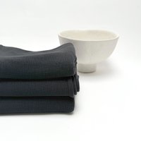 Schwarzes Handtuch Aus Baumwolle Mit Waffelmuster von pilosale