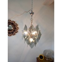 Vistosi Murano Facettierte Geräucherte Rauten Glas Kronleuchter 70Er Jahre Vistosi Murano Facettierte Geräucherte Rauten Glas Kronleuchter 70Er Jahre von retroaleksandar