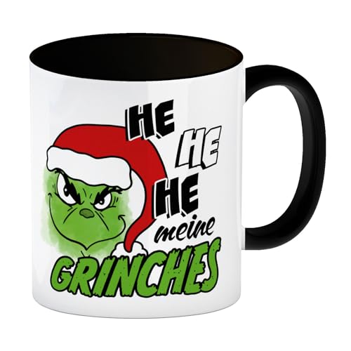 Weihnachtsmuffel Kaffeebecher in schwarz mit Spruch He he he meine Grinches eine bunte Tasse für die Arbeit grünes grinsendes Gesicht Weihnachtsmann Motiv Weihnachten Kaffeetasse von speecheese