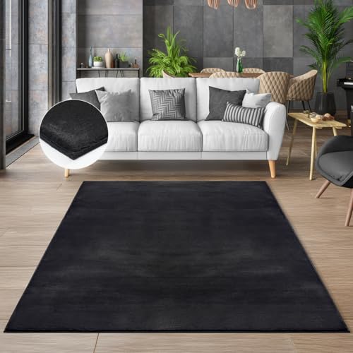 the carpet Cosy kuschelig Warmer Fellteppich, weich und elegant, waschbar und Fußbodenheizung geeignet, Öko-Tex Zertifiziert, Schwarz, 70 x 140 cm von the carpet
