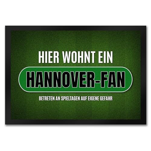 trendaffe - Hier wohnt EIN Hannover-Fan Fußmatte mit Rasen Motiv Fußball Stadion Ball Fan von trendaffe