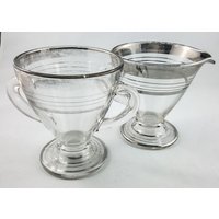 Glasform Und Silberrand Sahne Zucker Set Glasform Und Silberrand Sahne Zucker Set von whatadishcollection
